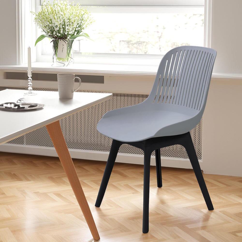 Classic White Plastic Chair, Set of Four, Durable and Lightweight - House Comfort