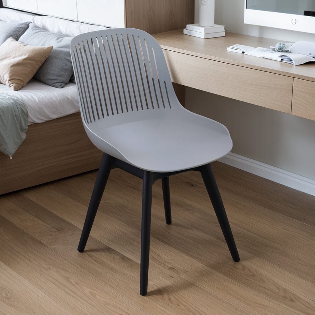 Classic White Plastic Chair, Set of Four, Durable and Lightweight - House Comfort