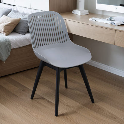 Classic White Plastic Chair, Set of Four, Durable and Lightweight - House Comfort