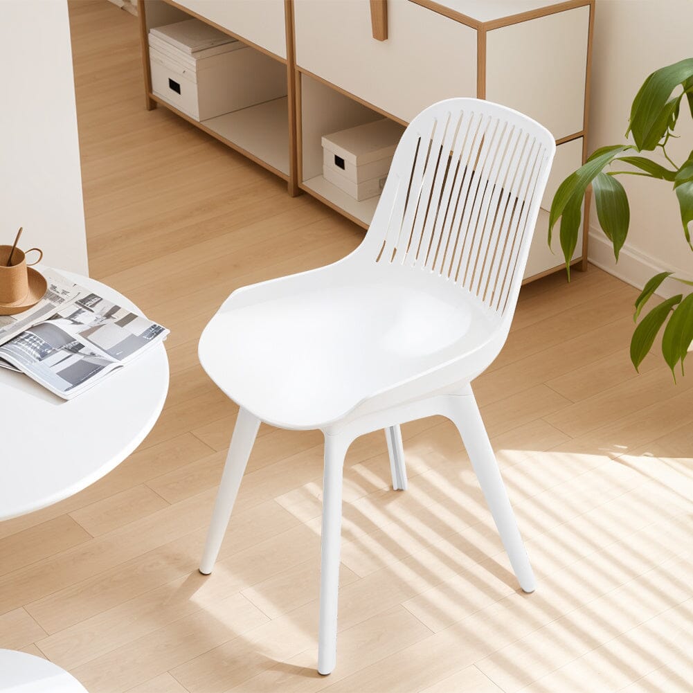 Classic White Plastic Chair, Set of Four, Durable and Lightweight - House Comfort