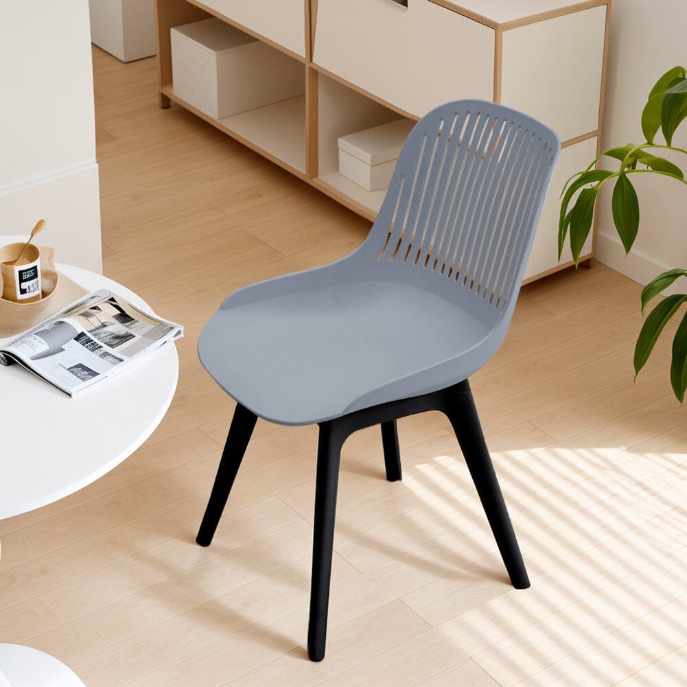 Classic White Plastic Chair, Set of Four, Durable and Lightweight - House Comfort