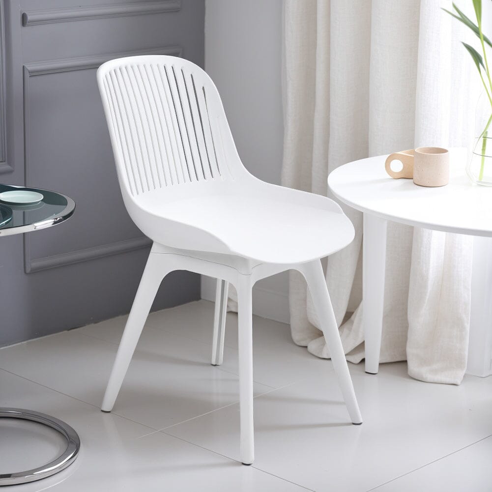 Classic White Plastic Chair, Set of Four, Durable and Lightweight - House Comfort