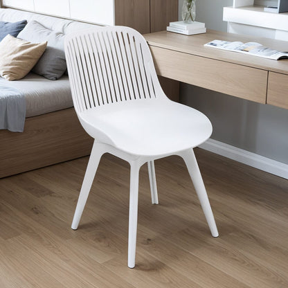 Classic White Plastic Chair, Set of Four, Durable and Lightweight - House Comfort